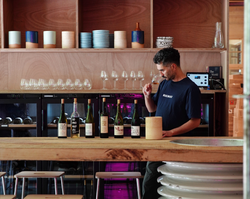 Man tasting wine at Warehouse